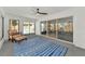 Bright sunroom with sliding glass doors and comfortable seating at 3607 57Th Avenue W Dr, Bradenton, FL 34210