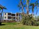 Two-story condominium building with lush landscaping at 4204 126Th W St # 506, Cortez, FL 34215