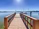 Wooden walkway to private waterfront dock at 451 20Th Ave, Indian Rocks Beach, FL 33785