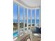 Ocean view sitting area with comfy chairs at 455 Longboat Club Rd # 504, Longboat Key, FL 34228