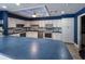 Community kitchen with stainless steel appliances and blue countertops at 4736 Independence Dr # 4736, Bradenton, FL 34210