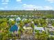 An aerial view of the property, highlighting its location near the water at 5019 Commonwealth Dr, Sarasota, FL 34242