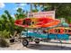 Rental shop offering kayaks and bikes, encouraging a fun lifestyle near the water, with vibrant kayaks at 5019 Commonwealth Dr, Sarasota, FL 34242