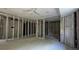 Unfinished bedroom with new framing and electrical work at 506 Treasure Boat Way, Sarasota, FL 34242