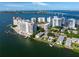 Waterfront community featuring various buildings and a vibrant, luxurious atmosphere at 509 Golden Gate Pt # 3, Sarasota, FL 34236