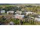 Complex of three-story buildings in a wooded area at 5209 Manorwood Dr # 3A, Sarasota, FL 34235