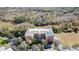 Three-story building with balconies and a green setting at 5209 Manorwood Dr # 3A, Sarasota, FL 34235