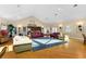 Bright and airy community room with hardwood floors and ample seating at 5209 Manorwood Dr # 3A, Sarasota, FL 34235