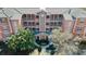 Three-story building with balconies and Mediterranean style at 5209 Manorwood Dr # 3A, Sarasota, FL 34235