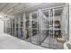 Secure storage unit with wire-mesh enclosure and shelving at 5209 Manorwood Dr # 3A, Sarasota, FL 34235