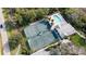 Aerial view of tennis courts and clubhouse at 5209 Manorwood Dr # 3A, Sarasota, FL 34235