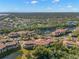 Wide aerial view of community, highlighting its location and amenities at 5601 Bentgrass Dr # 10-112, Sarasota, FL 34235