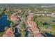 Expansive aerial view of community and surrounding area at 5601 Bentgrass Dr # 10-112, Sarasota, FL 34235