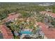 Resort-style pool in a lush tropical setting at 5601 Bentgrass Dr # 10-112, Sarasota, FL 34235