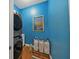 Laundry room with washer, dryer, and storage at 5868 Meriwether Pl, Sarasota, FL 34232