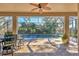 Spacious covered patio with outdoor dining and pool views at 5868 Meriwether Pl, Sarasota, FL 34232