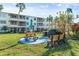 Relaxing outdoor space with picnic tables and grills at 5902 Garden Ln # A24, Bradenton, FL 34207