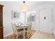 Dining area with table and chairs near the kitchen at 5902 Garden Ln # A24, Bradenton, FL 34207