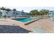 Inviting community pool with plenty of lounge chairs at 5902 Garden Ln # A24, Bradenton, FL 34207
