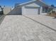 Spacious paver driveway with ample parking at 6525 Solitaire Palm Way, Apollo Beach, FL 33572