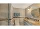 Elegant bathroom with granite vanity and walk-in shower at 7418 Westmoreland Dr, Sarasota, FL 34243