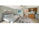 Spacious bedroom with a king-size bed and built-in wet bar at 7418 Westmoreland Dr, Sarasota, FL 34243