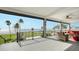 Covered deck with water views and comfortable seating at 7418 Westmoreland Dr, Sarasota, FL 34243