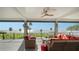 Covered waterfront deck boasts seating, and breathtaking water views at 7418 Westmoreland Dr, Sarasota, FL 34243