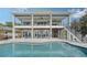 Two-story home with a large pool and waterfront views at 7418 Westmoreland Dr, Sarasota, FL 34243