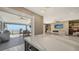 Open kitchen design with water views and access to a large deck and outdoor kitchen at 7418 Westmoreland Dr, Sarasota, FL 34243