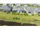 Aerial view of home with backyard lanai, overlooking canal at 7525 Alumni Trl, Sarasota, FL 34243