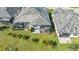Aerial view of home showcasing backyard lanai and landscaping at 7525 Alumni Trl, Sarasota, FL 34243