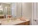Bathroom with vanity, sink, and a view of the shower at 7525 Alumni Trl, Sarasota, FL 34243