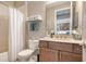 Small bathroom with shower/tub combo, toilet and vanity at 7525 Alumni Trl, Sarasota, FL 34243