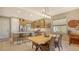 Kitchen dining area with wood table and seating at 7525 Alumni Trl, Sarasota, FL 34243
