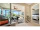 View down hallway showcasing access to patio and bedroom at 7525 Alumni Trl, Sarasota, FL 34243