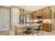 Modern kitchen with stainless steel appliances and island at 7525 Alumni Trl, Sarasota, FL 34243