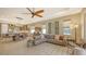 Open concept living room and kitchen with neutral tones at 7525 Alumni Trl, Sarasota, FL 34243