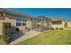 Enjoy this paver patio with seating next to the house at 7525 Alumni Trl, Sarasota, FL 34243