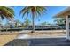 Waterfront backyard with walkway and lush landscaping at 834 Jungle Queen Way, Longboat Key, FL 34228