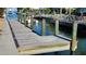 Wooden dock offering convenient boat access at 834 Jungle Queen Way, Longboat Key, FL 34228