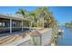 Wooden dock offering waterfront access and views at 834 Jungle Queen Way, Longboat Key, FL 34228