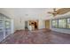 Kitchen features wood cabinets, granite countertops, and tile flooring at 834 Jungle Queen Way, Longboat Key, FL 34228
