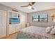 Bedroom with built-in entertainment center and ocean views at 8767 Midnight Pass Rd # 203F, Sarasota, FL 34242