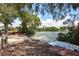 Kayak launch with paddleboards and picnic table at 8767 Midnight Pass Rd # 203F, Sarasota, FL 34242