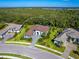 Aerial view of single-Gathering home with landscaped yard at 9224 Starry Night Ave, Sarasota, FL 34241