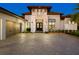 Evening view of home's entrance and garage at 9224 Starry Night Ave, Sarasota, FL 34241