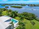 Aerial view of the property highlighting its waterfront location at 931 Bayshore Rd, Nokomis, FL 34275