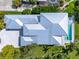 Modern home with metal roof and inground pool at 931 Bayshore Rd, Nokomis, FL 34275