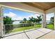 Covered balcony overlooking the water with stunning views at 931 Bayshore Rd, Nokomis, FL 34275